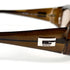 Profil gauche des lunettes de soleil Gucci vintage en acétate marron translucide