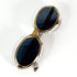Lunettes Maison Salanson vintage portées sur modèle blond cheveux bouclés