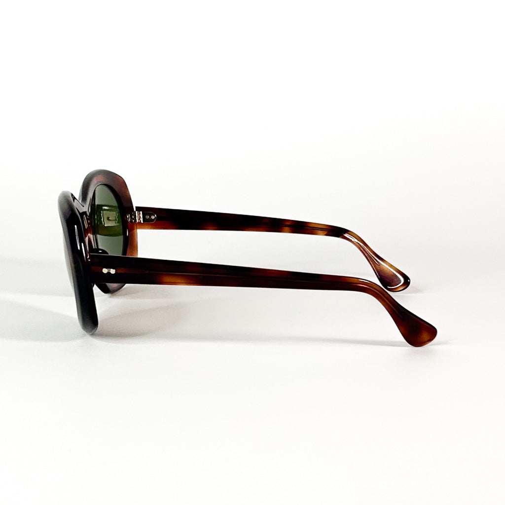 Détail charnière lunettes vintage écaille marron