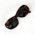 Monture lunettes vintage écaille marron vue face avec verres verts