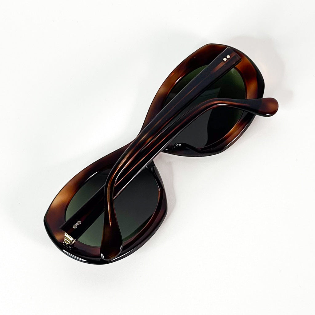 Monture lunettes vintage écaille marron vue face avec verres verts