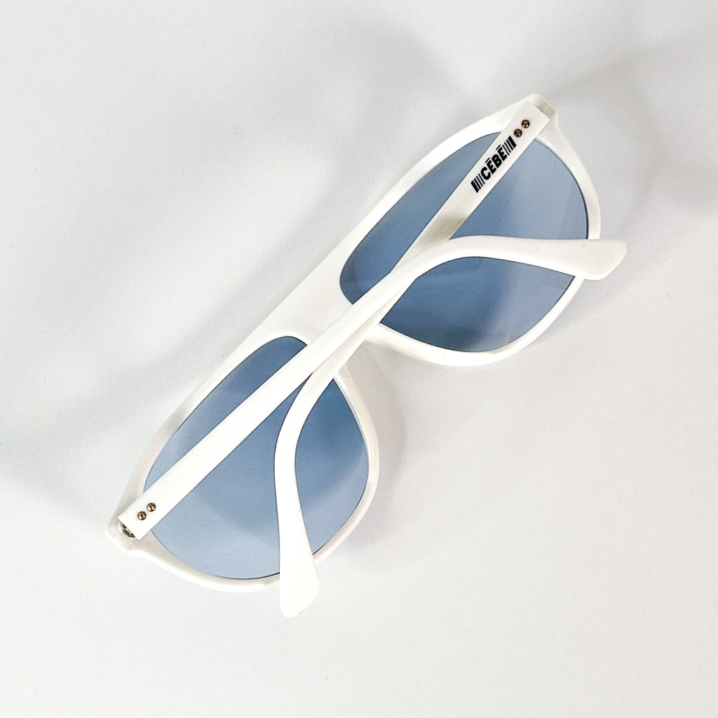 Lunettes Cébé vintage repliées – verres bleus et branches croisées