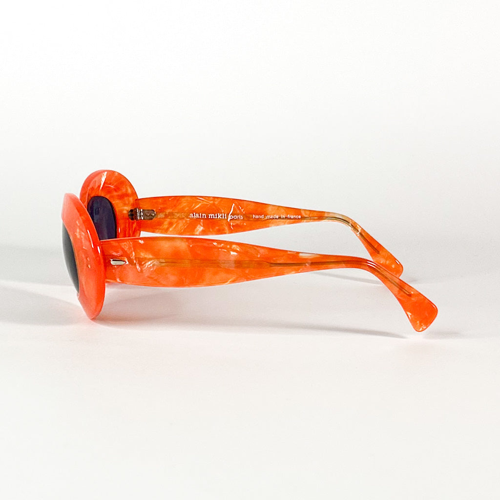 vue dessus lunettes vintage alain mikli orange artisanales