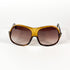 Portrait avec lunettes vintage Saphira portées – style rétro glamour