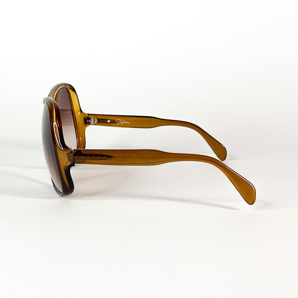 Lunettes Saphira vues de l’arrière – branches courbées et teinte brun clair