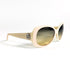Cartier vintage ivoire vue 3/4 avant, logo double C palladié visible sur la branche