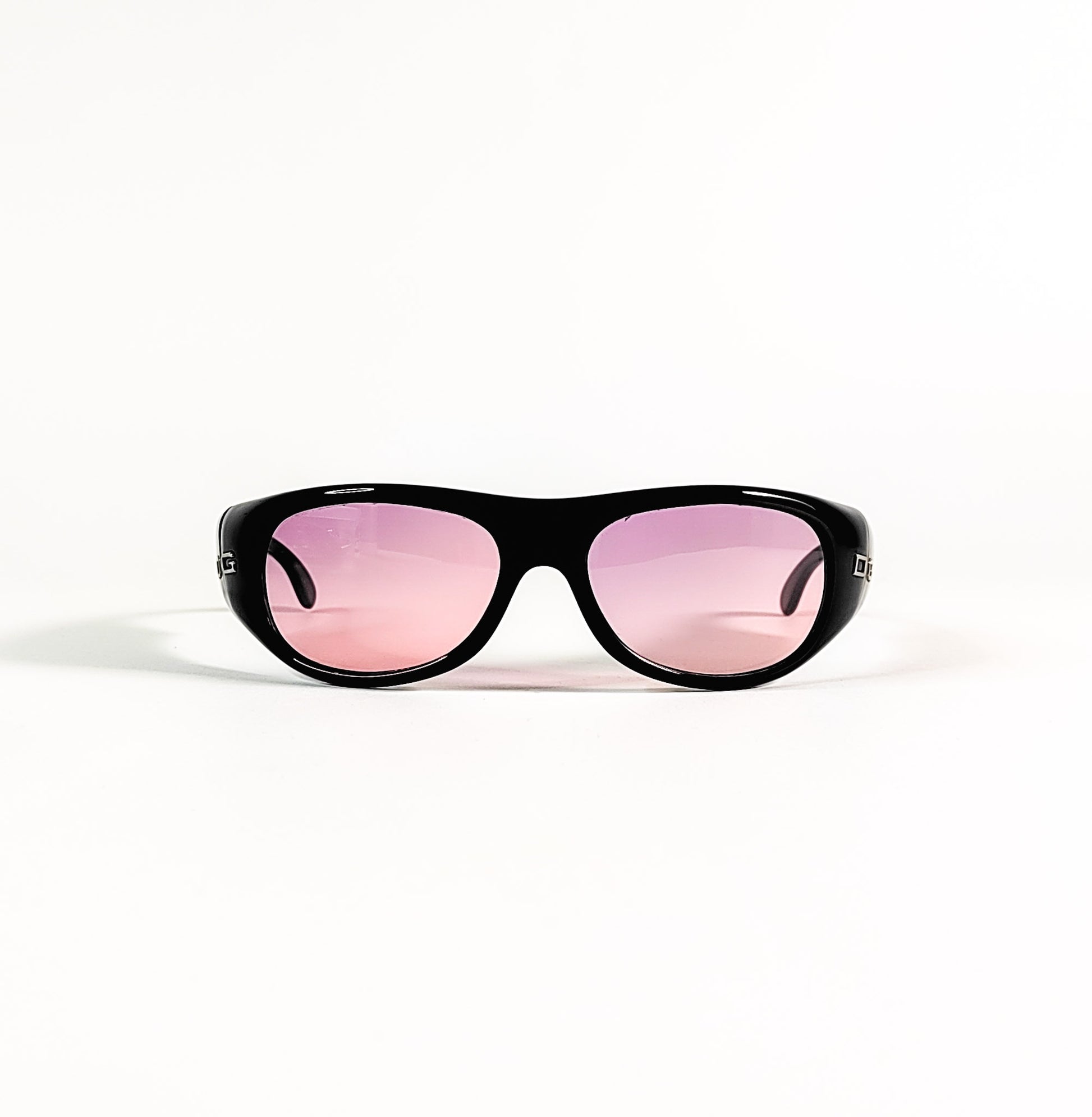 Lunettes de soleil vintage Dolce & Gabbana DG 728S, vue de face, acétate noir laqué et verres rose dégradé