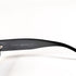 Gucci GG 2409/N/S, gros plan macro sur la signature GUCCI Made in Italy à l'intérieur de la branche.