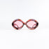 Lunettes de soleil vintage Sevima de face, monture pointue en acétate marbré rose, brun et bleu années 60