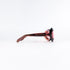 Profil complet des lunettes de soleil vintage Sevima en acétate marbré, branches longues effilées années 60-70
