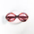Lunettes de soleil vintage Sevima vues de dessus, monture losange en acétate translucide multicolore