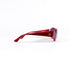 Profil pur lunettes Chanel 5022 acétate rouge translucide, pastille CC dorée à l'embout de la branche